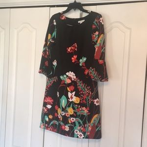 Fun spring dress with bell sleeve, zip back